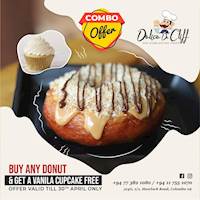 Buy any Donut and get a FREE vanilla cupcake with at Delice De Cliff 